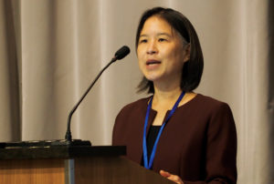 Photo of Nina Chang, NCBE, speaking at a podium