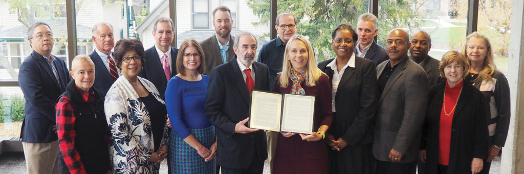 Group photo (see caption for people) taken at NCBE headquarters