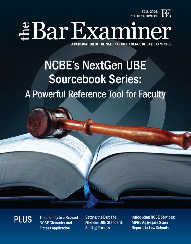 A wooden gavel lays across an opened textbook. The backdrop is solid black with a gray check mark.