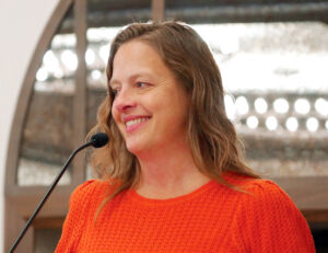 Photo of Emily Corson speaking at the CBAA Fall 2025 Meeting