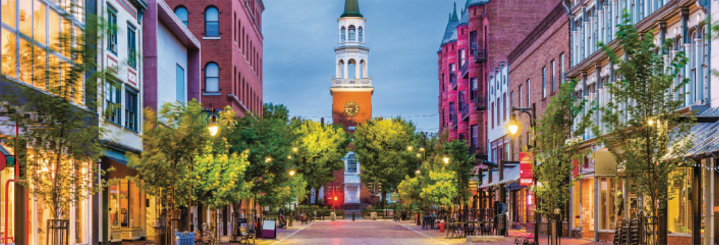 Street scene at dusk of downtown Burlington, Vermont, looking up Church Street