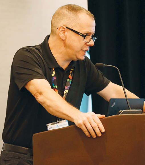 Jeffrey Shipley speaking at a podium 