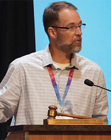 Photo of Darin Scheer speaking at the 2026 NCBE and Council of Bar Admission Administrators Annual Meeting.