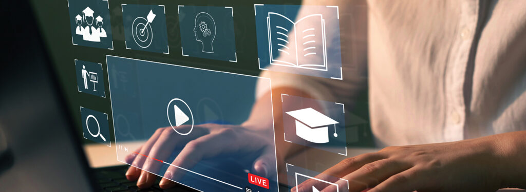 closeup of hands typing on a laptop keyboard with generic opaque icons floating above the keyboard. Icons surround a window like that playing a web video