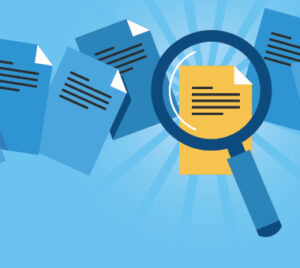 clip art of magnifying glass over a line of documents on a blue background. Document underneath the magnifying glass is yellow