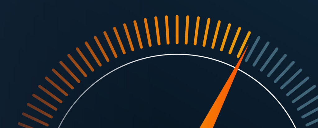 An analog meter shows against a black background. An orange needle points to the right. The tick marks left of the needle are a gradient of orange, and the remaining tick marks are gray.