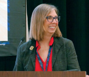 Photo of Sherry Hieber speaking at CBAA