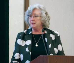 Photo of Marilyn Wellington speaking at CBAA