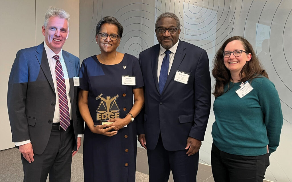 Group photo of John McAlary; Judge Phyllis D. Thompson; Hon. Solomon Oliver, Jr.; Joanne Kane, PhD